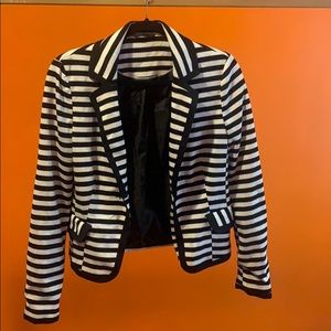 Black and white stripy jacket.